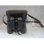 A PAIR OF HILKINSON BINOCULARS in a leather case