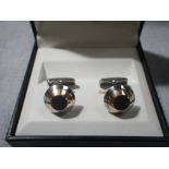 DUNHILL: Gentleman's rose gold and steel cufflinks, rose gold of screw form, raised on steel with