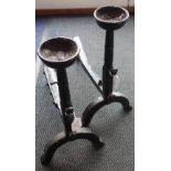 A PAIR OF 18TH CENTURY WROUGHT IRON FIRE DOGS with cup finials and spit rests