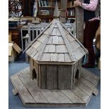 AN OAK DUCK HOUSE of hexagonal form with three Gothic openings, pyramidal shingled roof with