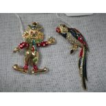 A CLOWN BROOCH, and a parrot brooch (2)