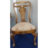 A GEORGE II STYLE WALNUT SIDE CHAIR, with a shaped splat and carved cabriole legs