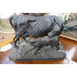 A 19TH CENTURY STYLE CAST IRON FIGURE OF A COW AND CALF, indistinctly signed 'P J Mene', 22cm wide