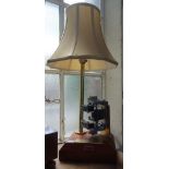 A VINTAGE TABLE LAMP with brass plaque 'Farewell to an Old Timer', on an oak base