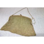 A GILT METAL MESH EVENING BAG (one clasp stone missing)