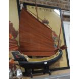A LARGE SCRATCH BUILT STUDY OF A JUNK, with a black lacquered hull and russet red sail, 96cm high