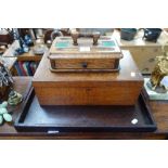 A VICTORIAN OAK DESK STAND, an oak writing box and a tea tray