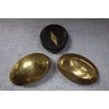 A BRASS PILL BOX; 'GEORGE COOMBES 42 DANIEL ST CATHAYS CARDIFF FEB 13 1911', another and a '