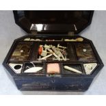 A 19TH CENTURY CHINESE LACQUER WORKBOX, with a fitted interior, including bone bobbins and a