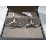 DUNHILL: Gentleman's silver cufflinks, of propeller form, with curved solid bar connections,