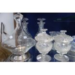 A PAIR OF 19TH CENTURY CUT GLASS SWEETMEAT JARS of urn form, a pair of decanters and other