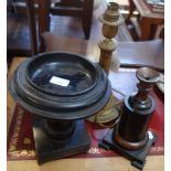 A 19TH CENTURY EBONISED WOOD TAZZA, 22.5cm high, a turned wooden stand and a brass table lamp (3)