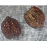 A FINE PAIR OF MATCHING WALNUTS, QING DYNASTY, of similar size and form, 4 cm high