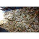 A SUITE OF CREAM GROUND FLORAL CURTAINS (examine)