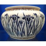 A JAPANESE JARDINIERE decorated with iris, character mark to the base, 25cm dia.