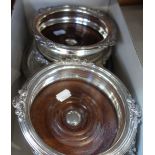 A SET OF FOUR SILVER PLATED BOTTLE COASTERS and a plated salver (5)