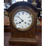 AN EDWARDIAN WALNUT CASED MANTEL CLOCK, 30cm high