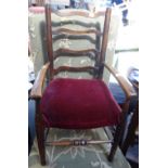 AN EDWARDIAN CHLD'S LADDER BACK CHAIR