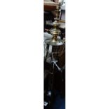 AN EDWARDIAN BRASS STANDARD LAMP