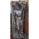 A 19TH CENTURY OAK CARVING OF A WARRIOR, originally part of a piece of furniture, 70cm high