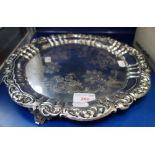 A RUSSIAN SILVER PLATED SALVER on three feet, 32cm dia.