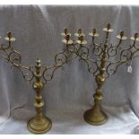 A PAIR OF LARGE BRASS CANDELABRA, 84cm high (one centre section missing)