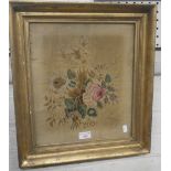 A REGENCY WOOLWORK FLORAL PICTURE in a gilt frame