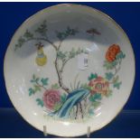 A CHINESE FAMILLE ROSE DISH decorated with peonies, four character mark to base, 18cm dia.