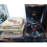 A VINTAGE HMV PICNIC GRAMOPHONE and a collection of 78s