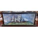 A SCRATCH BUILT MODEL OF A SAILING SHIP, in a glazed case, 12cm high x 31cm wide