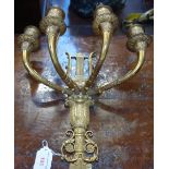 A 19TH CENTURY GILT BRASS FOUR BRANCH EMPIRE STYLE WALL LIGHT, 30cm high