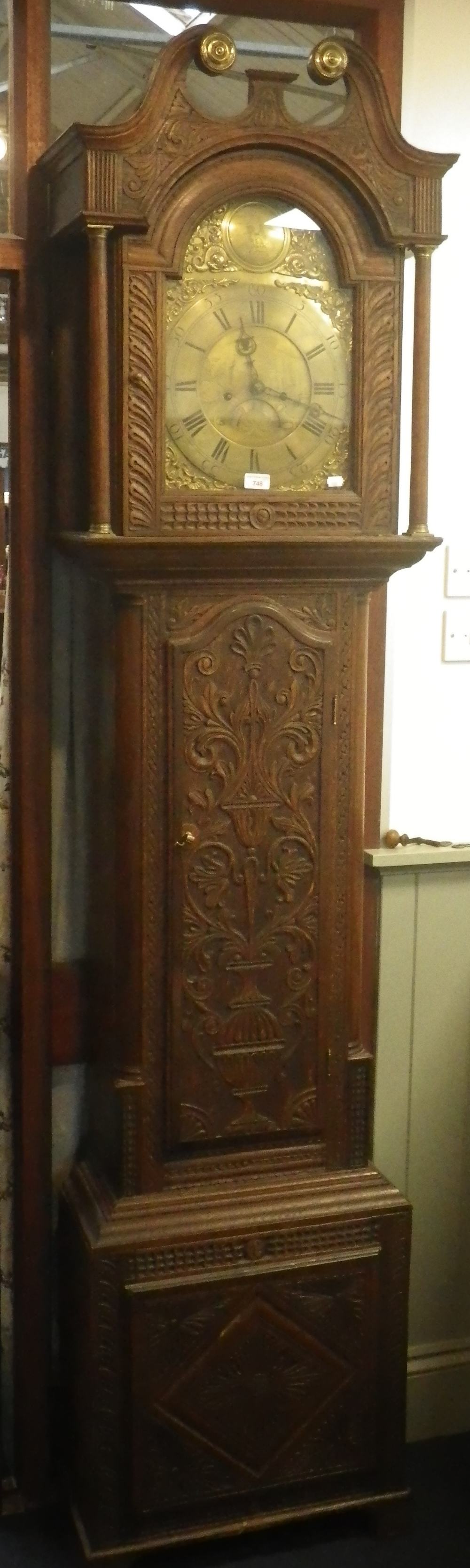 AN OAK CASED EIGHT-DAY GEORGE III LONGCASE CLOCK, with 30cm brass arched dial, engraved with