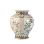 A CHINESE FAMILLE-VERTE BALUSTER JAR, LATE QING DYNASTY, the ovoid sides painted with panels of