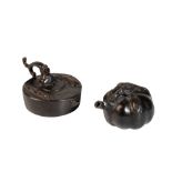 TWO JAPANESE BRONZE WATER DROPPERS, one formed as a peach and the other an oil lamp, 7cm wide,