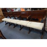 A BANK OF FIVE VINTAGE OAK AND IRON TIP UP CINEMA SEATS, 260cm long (overall)