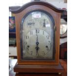 AN EDWARDIAN MAHOGANY CASED BRACKET CLOCK with silvered dial, 40.5cm high