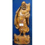 A CARVED CHINESE WOODEN STUDY OF A BEARDED MAN, 39cm high