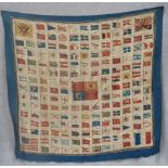 A 19TH CENTURY SILK SCARF SHOWING WORLD FLAGS, GROUPED AROUND THE ROYAL STANDARD