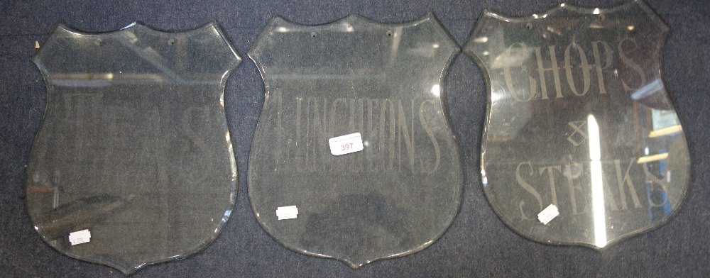 THREE EDWARDIAN ETCHED GLASS SHIELD SHAPED SHOP SIGNS, 'Teas', 'Chops & Steaks' and 'Luncheons'