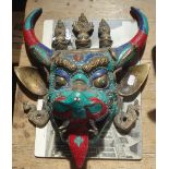 A BRONZE AND HARDSTONE INLAID MASK, TIBET, 20TH CENTURY, modelled as a horned mythical beast