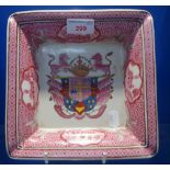 AN ARMORIAL DISH of square form, 20cm wide