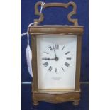 AN EARLY 20TH CENTURY BRASS CASED CARRIAGE CLOCK, Stewart & Co London