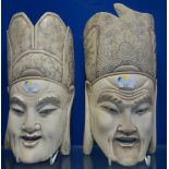 TWO CHINESE CARVED IVORY MASKS, LATE QING DYNASTY, modelled as officials, 26cm high