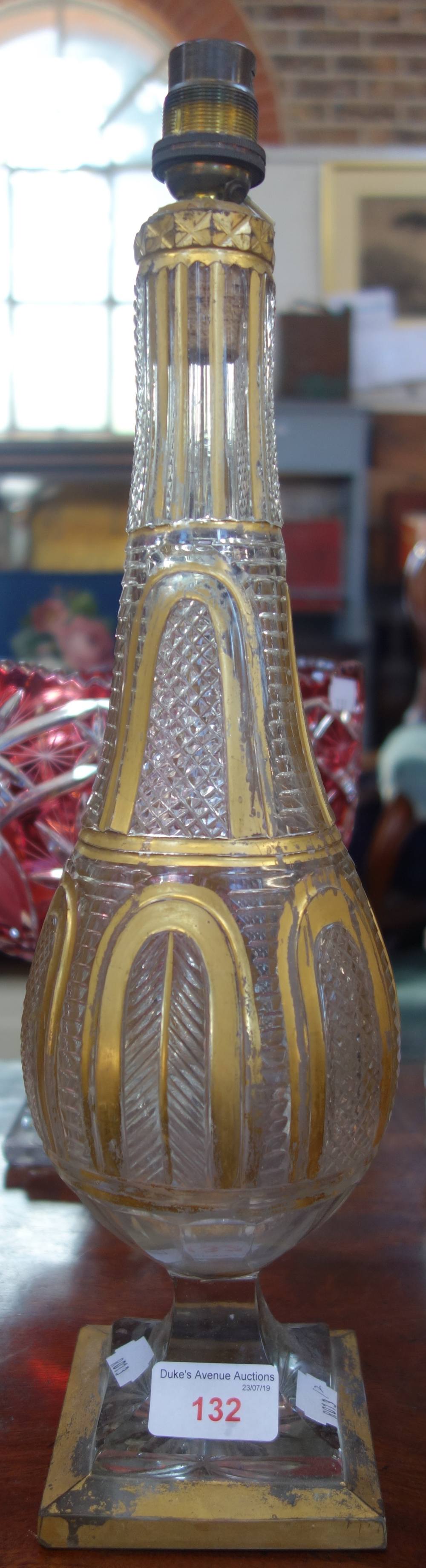 A 19TH CENTURY CUT GLASS AND GILT OVERLAID PEDESTAL VASE (with bayonet fitting, not drilled), 37cm