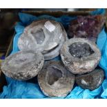 A PURPLE MINERAL FRAGMENT and a collection of geodes