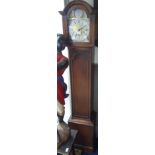 A 1920S OAK CASED GRANDMOTHER CLOCK with brass face and silver chapter ring, 167cm high