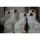 A COLLECTION OF STAFFORDSHIRE FLAT BACK DOGS (6)