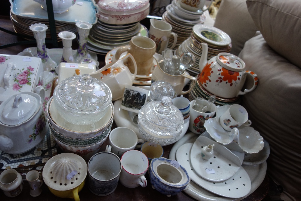 A COLLECTION OF CERAMICS to include plates and cheese dishes, with some glassware