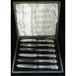 A SET OF SIX SILVER HANDLED FRUIT KNIVES, in a fitted presentation case