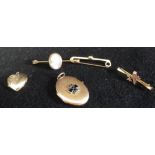 THREE 9CT YELLOW GOLD BAR BROOCHES, a 9ct heart locket and a WWI locket (5)